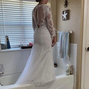 Unused white wedding dress size 6